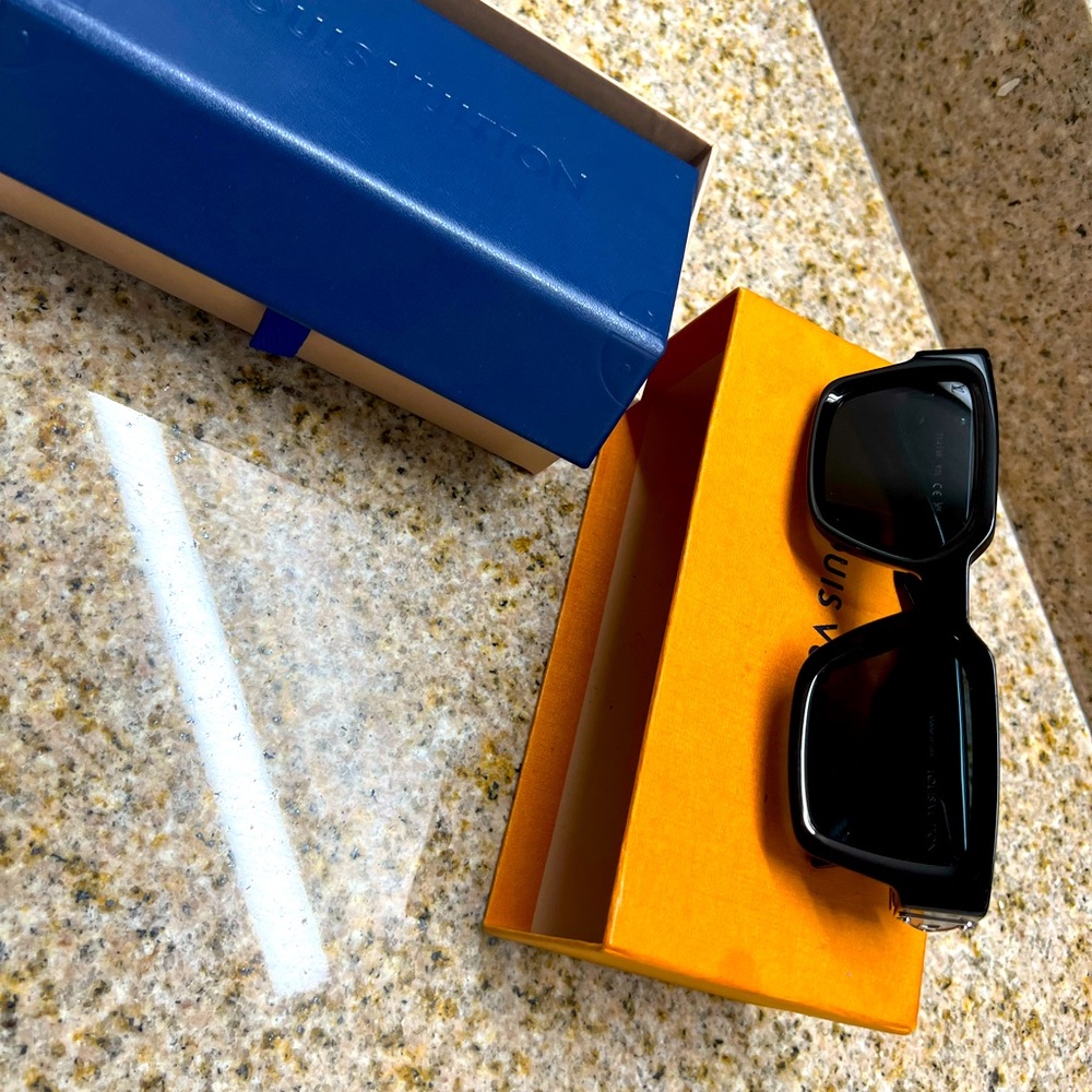 Louis Vuitton shades (not millionaires)